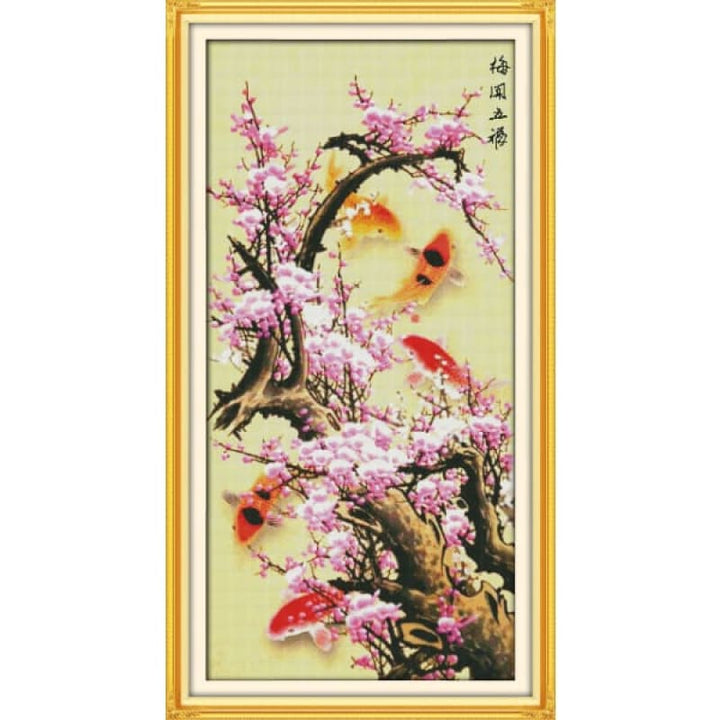 Blooming plum flower with 5 fishes