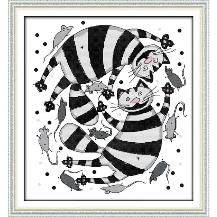 The black and white cats hunting the mice